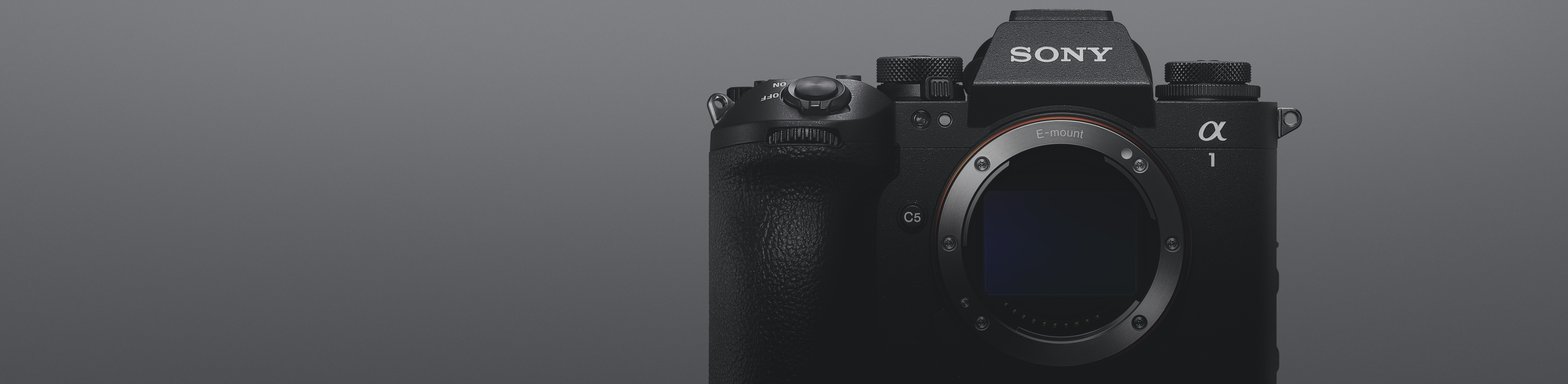 Front view of Sony Alpha 1 on grey background