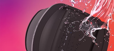 Image of the XP500 X-Series Portable Speaker with splashes of water to showcase the water resistance.